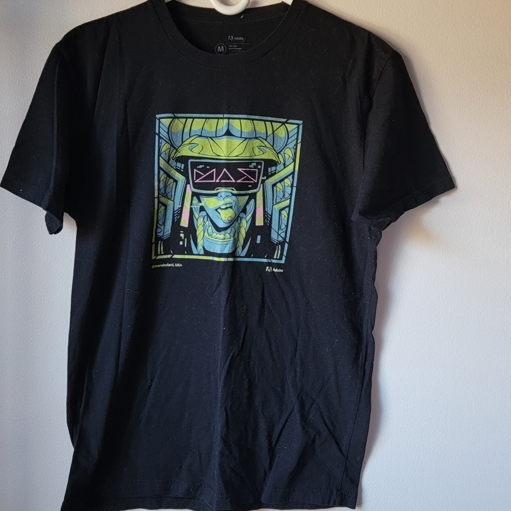 Black Graphic Tee with Futuristic Design‎